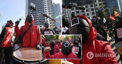 Протесты в Южной Корее – люди вышли на митинги в костюмах из Игры в кальмара, фото и видео - obozrevatel.com - Южная Корея