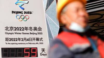 Доминик Рааб - В Великобритании пообещали рассмотреть вопрос о бойкоте Олимпиады в Китае - iz.ru - Англия - Китай - Израиль - Новая Зеландия - Covid-19