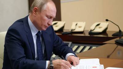 Владимир Путин - Путин наградил дипломатов за вклад в реализацию внешней политики - russian.rt.com - Россия - Мавритания