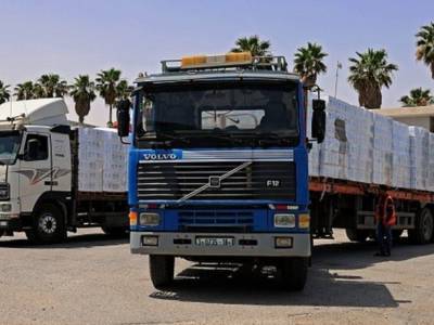 Первые колонны с гуманитарной помощью прибыли в сектор Газа - unn.com.ua - Киев - Израиль