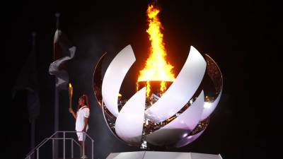 Наоми Осака - В Токио зажгли огонь XXXII летних Олимпийских игр - russian.rt.com - Япония - Токио