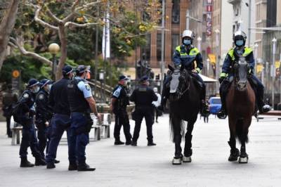 В Сиднее полиция окружила центр города, чтобы предотвратить митинг из-за всплеска случаев COVID-19 - unn.com.ua - Украина - Австралия - Киев - Сидней