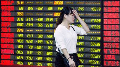 Азиатские биржи 21 января закрылись снижением вслед за индексами Уолл-стрит - bin.ua - Украина - Сша - Япония - Shanghai