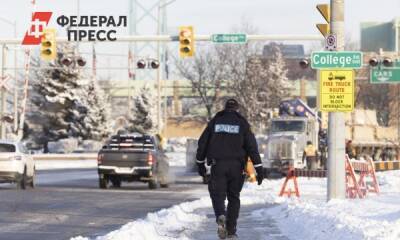 Одиннадцать вооруженных мужчин задержали в Канаде во время акции дальнобойщиков - fedpress.ru - Канада - Оттава