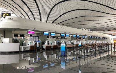 Пекинский аэропорт начал принимать рейсы впервые с начала пандемии - korrespondent.net - Украина - Китай - Ухань - Пекин